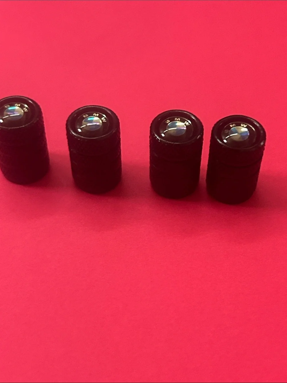 BMW Black Tire Valve Caps with Blue & White Logo - Set of 4